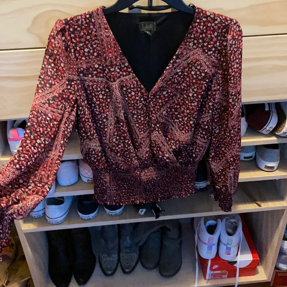 Long sleeve, deep V neck blouse